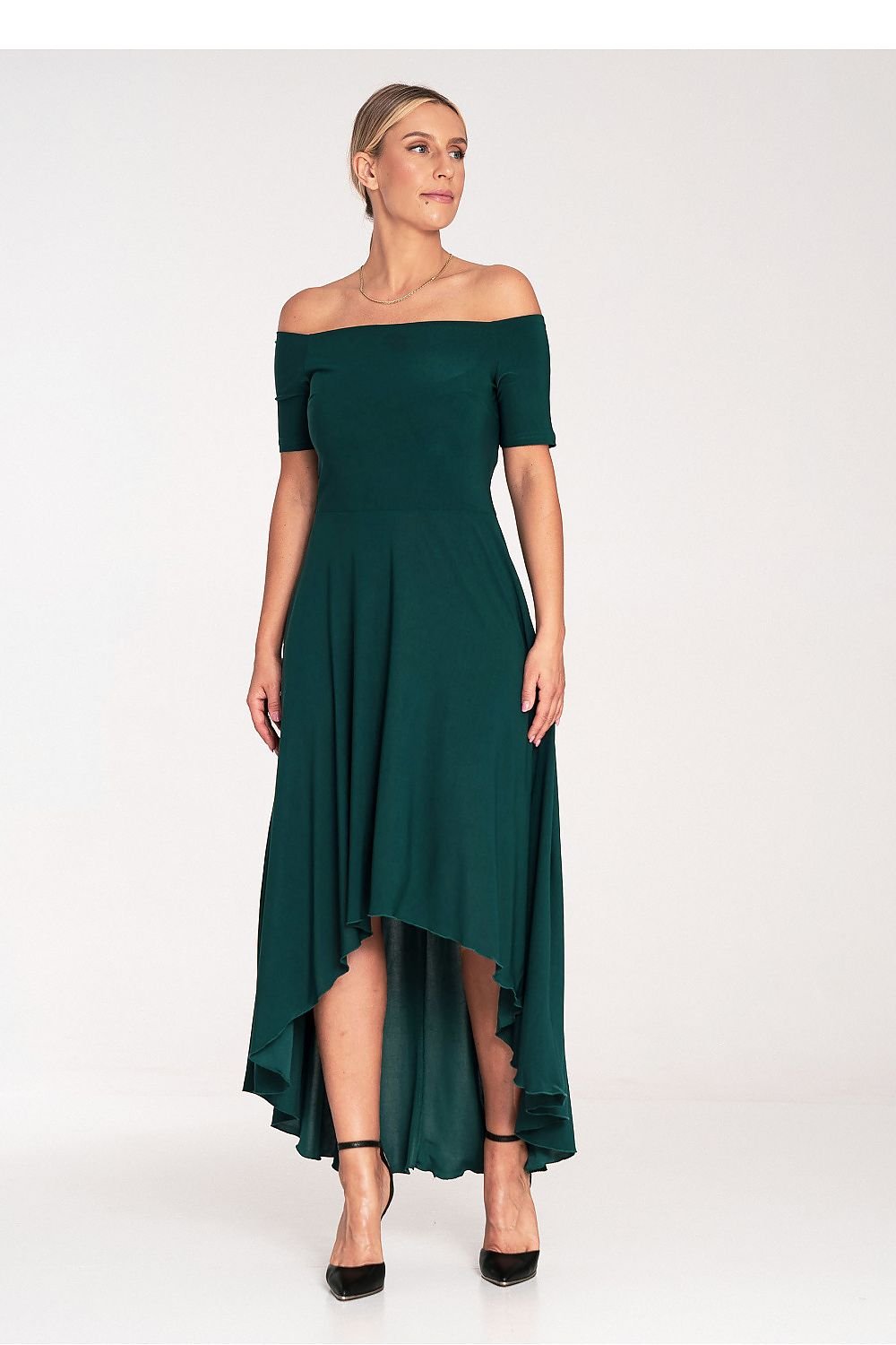 This striking asymmetrical dress features a chic strapless design with a fitted waist, creating a flattering silhouette. The back of the dress reaches maxi length, while the front is cut to knee-length, offering a bold and modern contrast. The bottom is loose and flared, adding movement and a touch of elegance. Zippered at the back for a smooth, secure fit, this dress is perfect for making a statement at special events or formal occasions.


