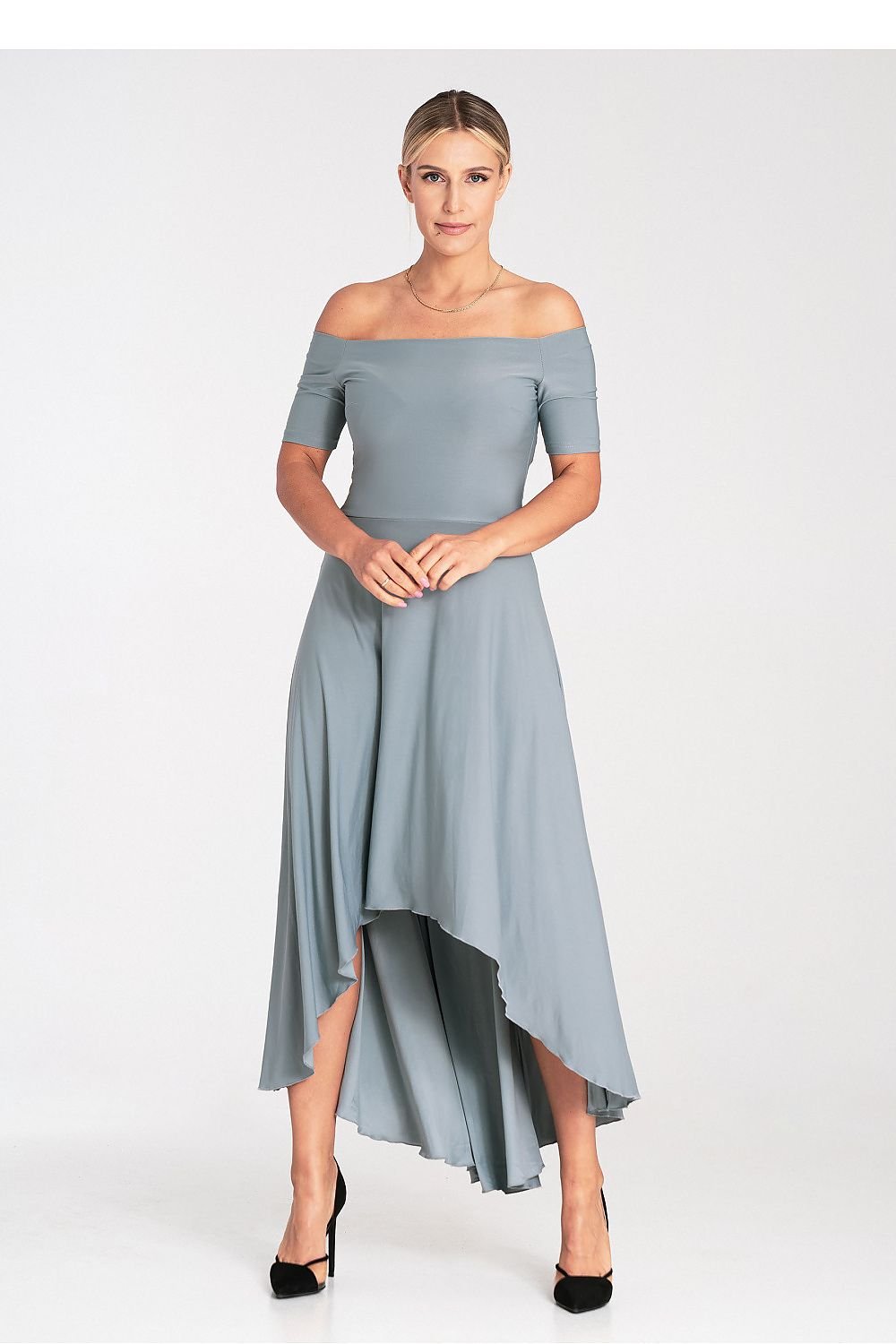 This striking asymmetrical dress features a chic strapless design with a fitted waist, creating a flattering silhouette. The back of the dress reaches maxi length, while the front is cut to knee-length, offering a bold and modern contrast. The bottom is loose and flared, adding movement and a touch of elegance. Zippered at the back for a smooth, secure fit, this dress is perfect for making a statement at special events or formal occasions.


