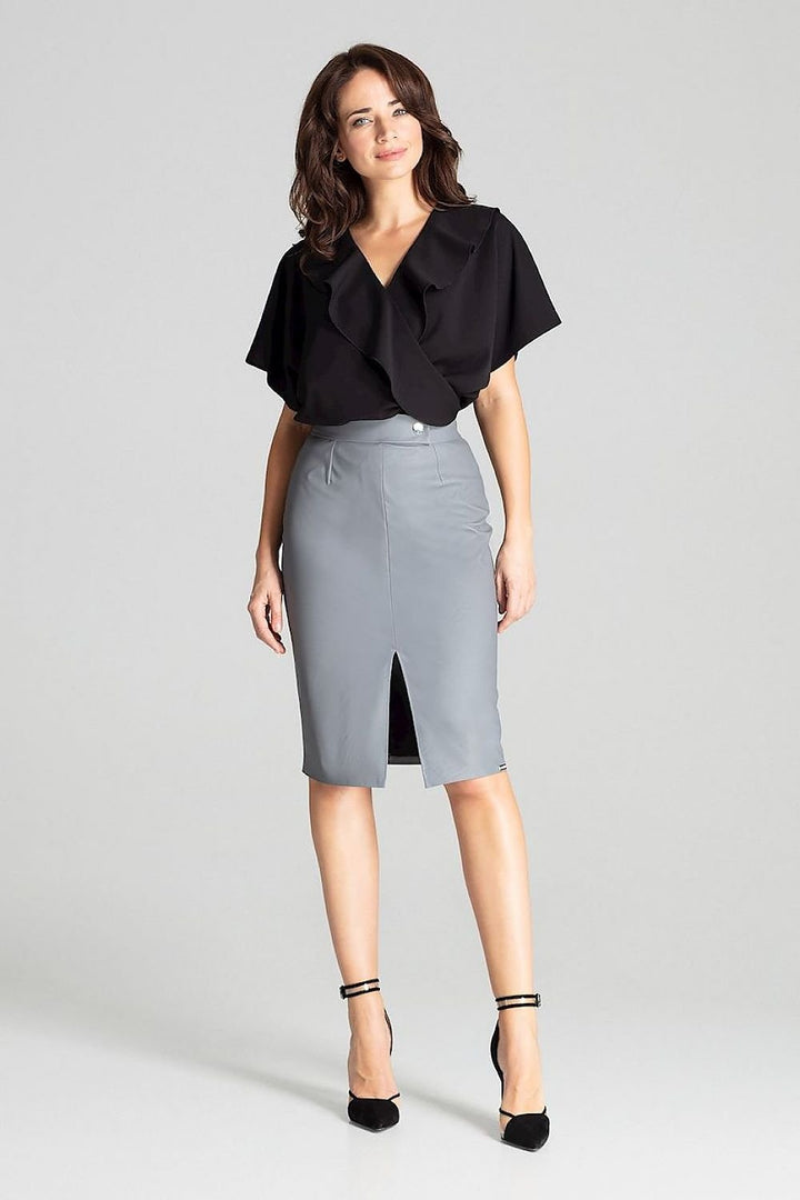 A chic black eco-leather midi pencil skirt with a decorative front clasp, back zip closure, and a delicate front slit. Designed for a sleek, minimalist silhouette.






