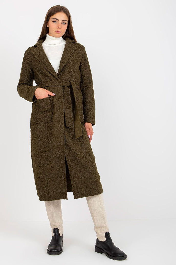 Chic women's coat with long sleeves, patch slip pockets, and a buttoned front. Featuring a tie belt for a customizable fit, this unlined coat offers a stylish, casual look perfect for everyday wear.




