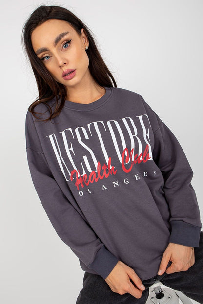 A long-sleeved cotton sweatshirt with a pull-over design, featuring a decorative print on the front. Ideal for casual, everyday wear.


