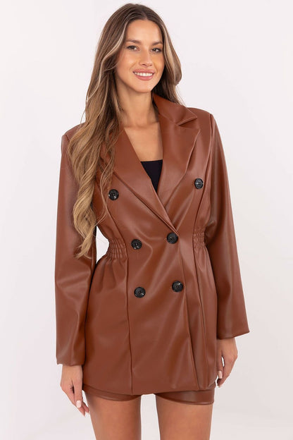 A sophisticated women's eco-leather jacket made from a durable blend of polyester and polyurethane. Featuring wide lapels, sewn-in shoulder pads, a double-breasted button fastening, and decorative waist creases, this standard-length blazer combines elegance with a feminine, structured silhouette. Lined for comfort, it is perfect for fall, winter, and spring, offering versatile styling options for both casual and formal occasions.






