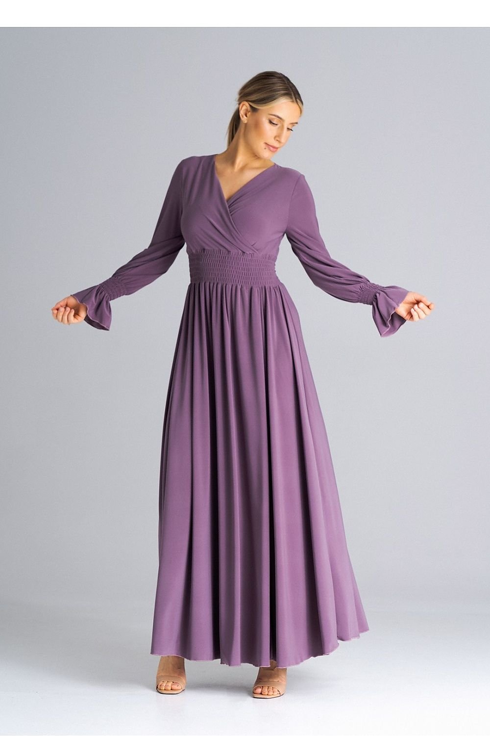 A chic maxi dress with buffet sleeves, an overlapped neckline, crinkled waist, and a side slit for a sophisticated and stylish look






