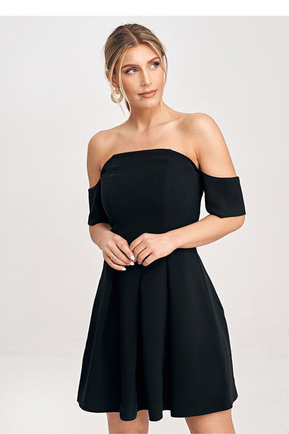 This elegant mini dress is crafted from high-quality fabric, ensuring a luxurious feel and sophisticated look. The dress is designed with a waist-cut silhouette, beautifully accentuating the figure, while the exposed back adds a touch of allure. Fastened with a covered zipper at the back, this dress offers a sleek, polished finish. Perfect for any occasion, it effortlessly combines style and elegance for a chic and flattering look.






