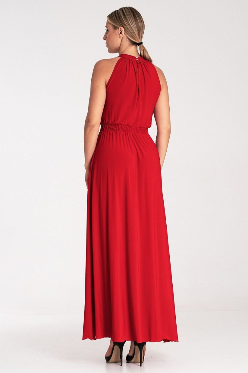 A sleeveless maxi dress featuring a pearl clasp at the back, ruffled top with a V-neckline, elastic waistband for comfort, and stylish side slits for added elegance.






