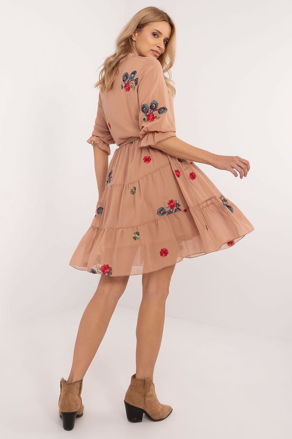 Elevate your style with this charming flared dress, designed to blend everyday comfort with timeless elegance. Crafted from a premium mix of cotton, elastane, and polyester, it offers a perfect fit and a soft feel. The embroidered fabric adds a unique touch, enhancing its subtle beauty. With a below-the-knee cut, 3/4-length sleeves, and a stand-up collar, this dress combines classic sophistication with a feminine silhouette. The partial button closure and tie belt at the waist ensure a flattering fit, while