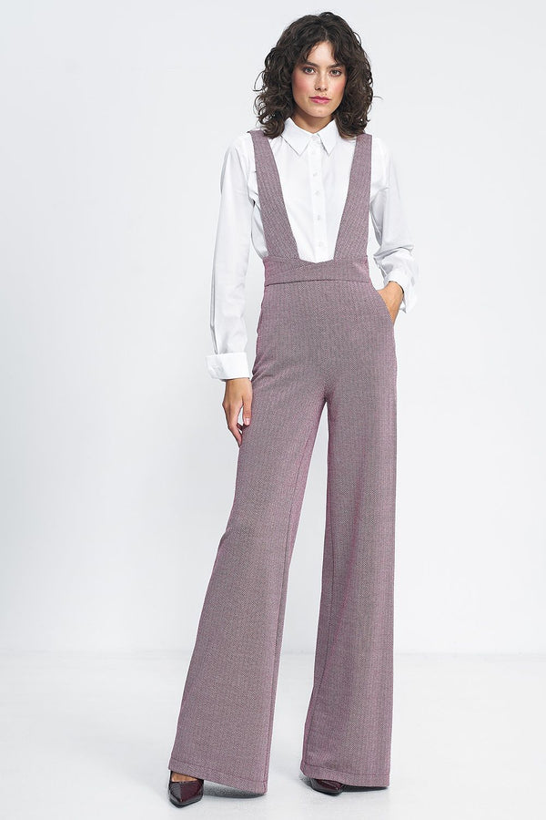 A trendy high-waisted jumpsuit with wide legs, suspenders, and practical pockets. This must-have piece combines retro-inspired design with modern fabrics and a timeless pattern. The suspenders fasten at the back with two buttons for added style and adjustability, making it the standout hit of the season.






