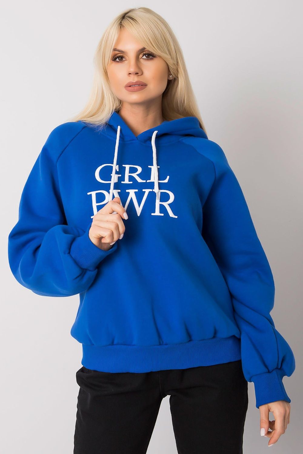 A cozy women's long sleeve sweatshirt with a hood, ideal for cool mornings and evenings. Offering both comfort and style, this hoodie is perfect for casual wear during transitional weather.






