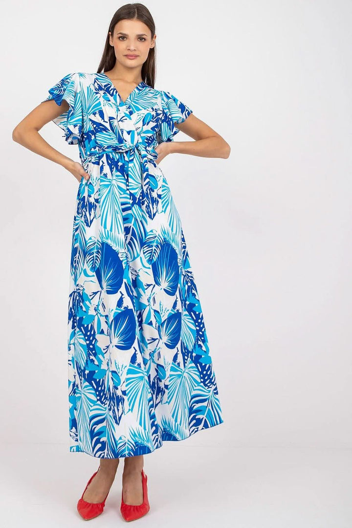 Long summer dress with short sleeves in the form of frills. Envelope neckline, tied at the waist. A perfect proposal for many occasions.