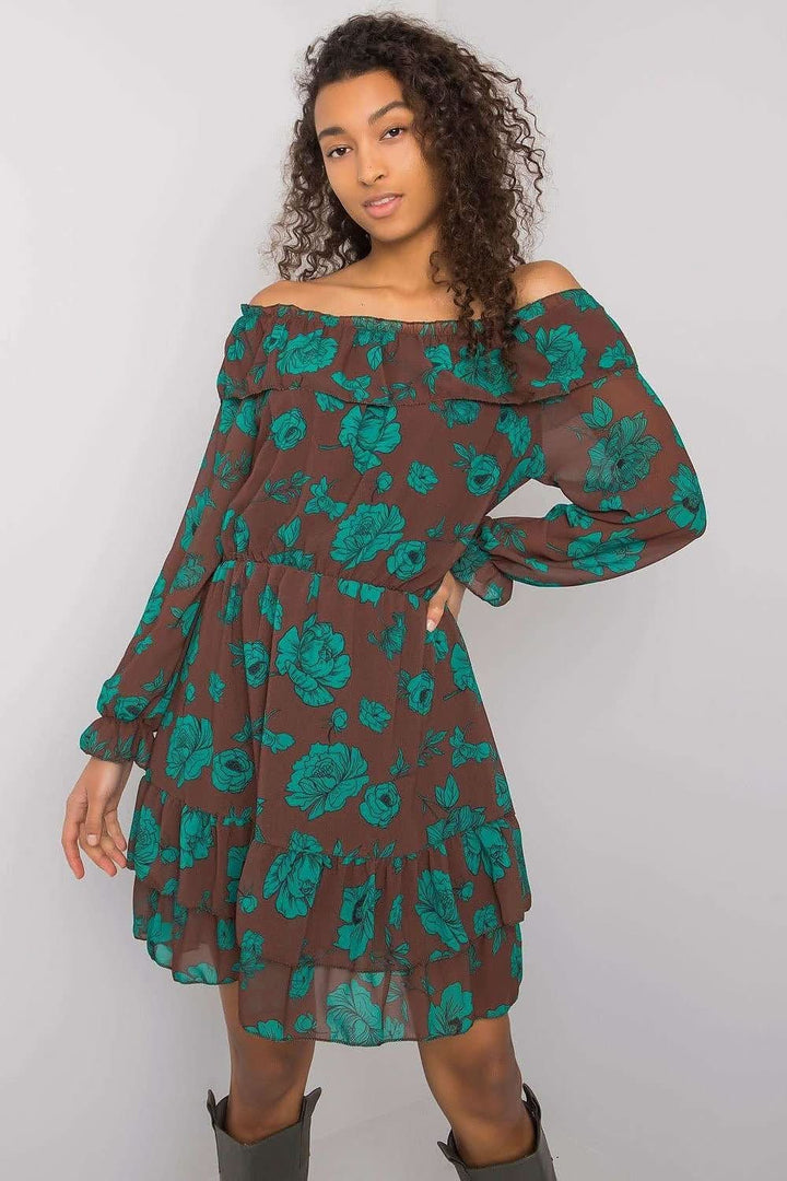This elegant dress features long sleeves and a flattering Spanish-style neckline, adding a bold and graceful touch. The dress is fully lined for comfort, while the bottom is beautifully adorned with delicate frills, enhancing its feminine charm. A perfect blend of classic style and modern flair, ideal for both casual and more formal occasions.






