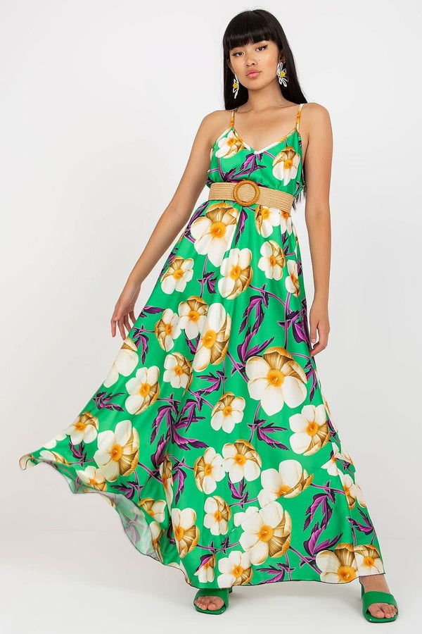 Casual yet elegant floral long summer dress with a flared cut, straps, and a braided belt, ideal for everyday wear and special occasions.






