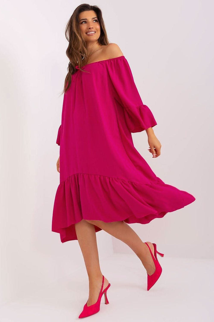 This breezy summer dress offers a relaxed, loose fit that ensures comfort on warm days. Featuring 3/4 sleeves and a round neckline, it provides a simple yet stylish silhouette. The sleeves and bottom of the dress are beautifully finished with playful frills, adding a feminine touch and lightness to the design. Perfect for casual outings or laid-back days, this dress combines effortless style with comfort.






