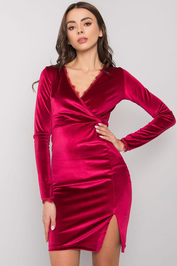 A  velour mini dress with long sleeves and a sexy slit at the bottom, perfect for a variety of occasions.






