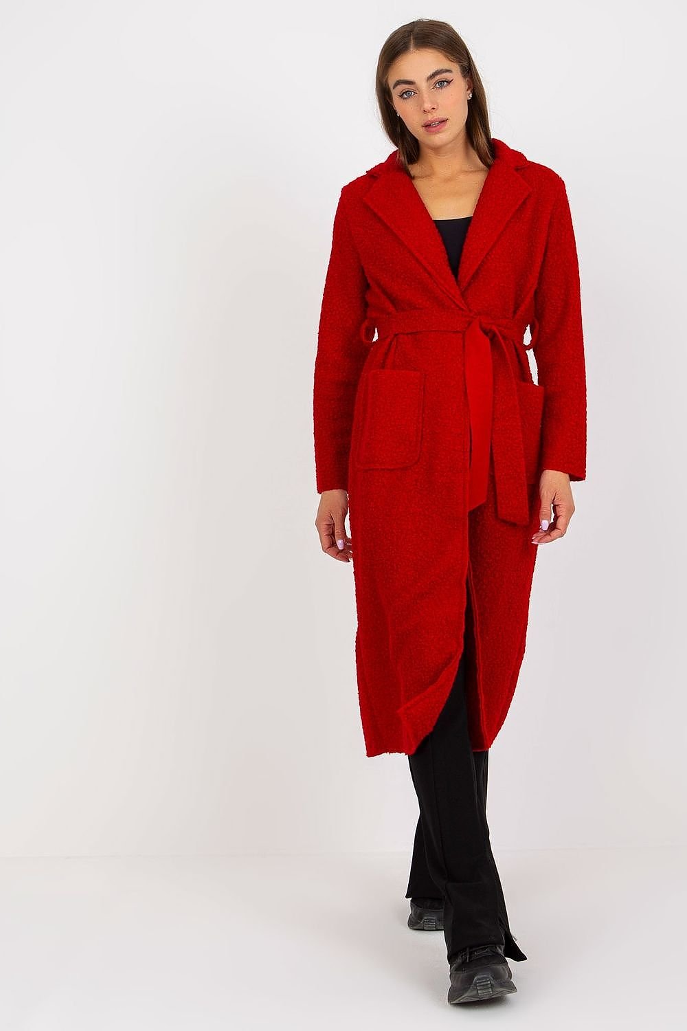 Chic women's coat with long sleeves, patch slip pockets, and a buttoned front. Featuring a tie belt for a customizable fit, this unlined coat offers a stylish, casual look perfect for everyday wear.




