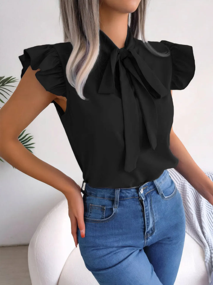 Ludowika Ruffled Tie Neck Cap Sleeve Blouse