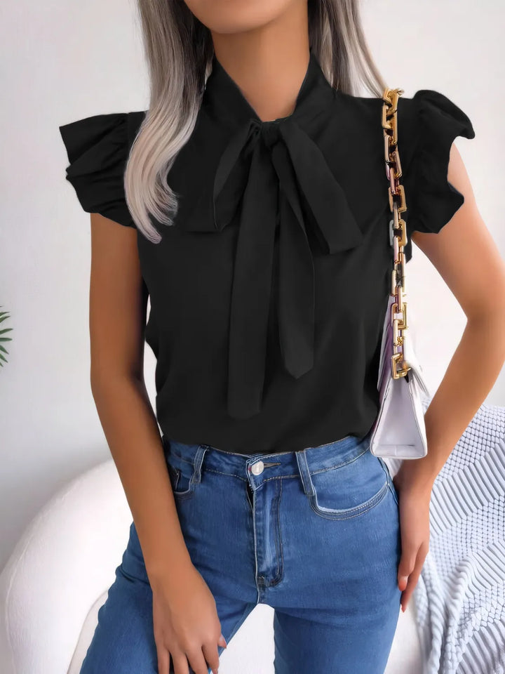 Ludowika Ruffled Tie Neck Cap Sleeve Blouse