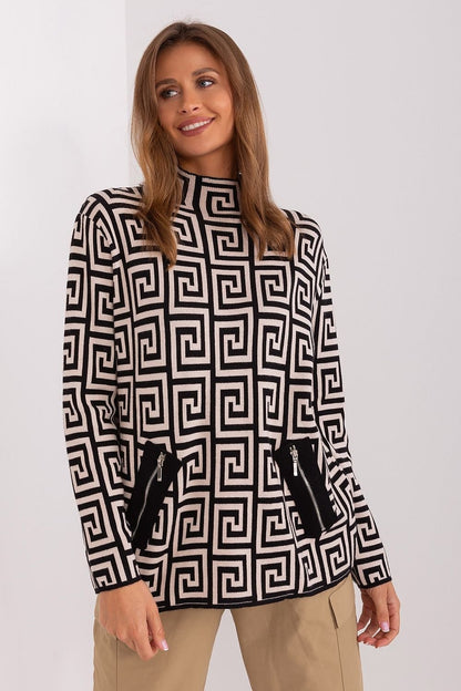 Fashionable women's sweater with long sleeves, a half turtleneck, and a geometric pattern, featuring zippered pockets, perfect for everyday wear and work during colder days.






