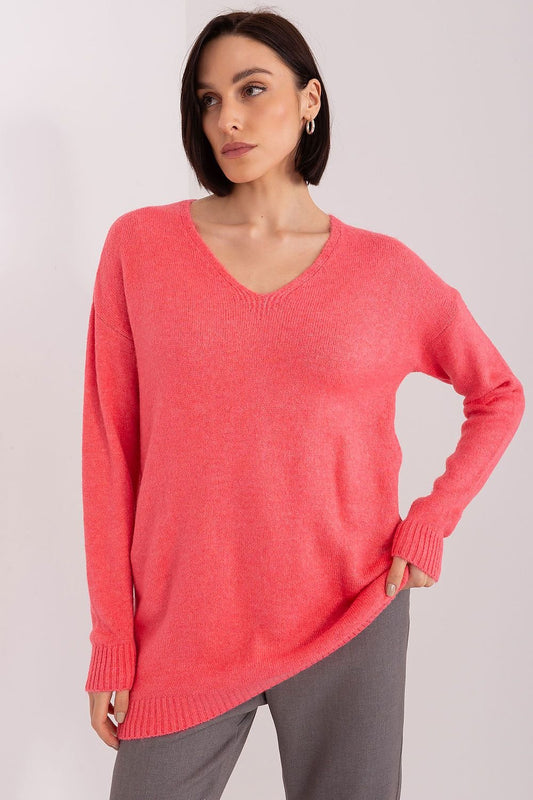 A soft pink sweater with long sleeves and a heart-shaped neckline, perfect for casual or semi-formal occasions. Made from comfortable, easy-care acrylic fabric, ideal for colder days.






