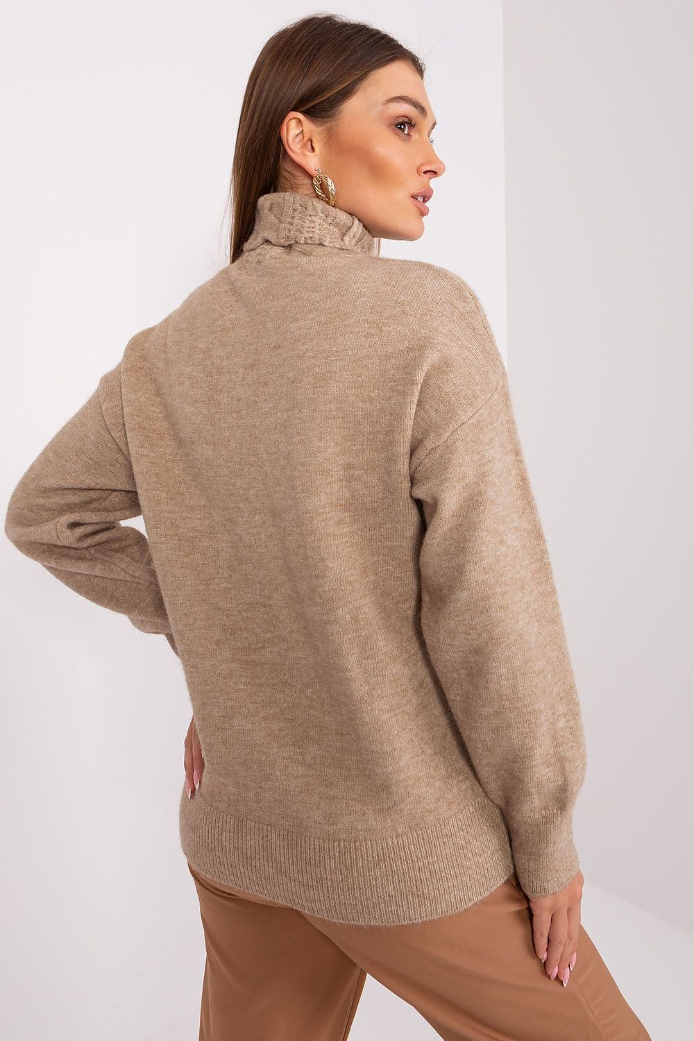 Pull à col roulé chic et confortable avec texture tissée variée