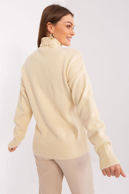 Pull à col roulé chic et confortable avec texture tissée variée