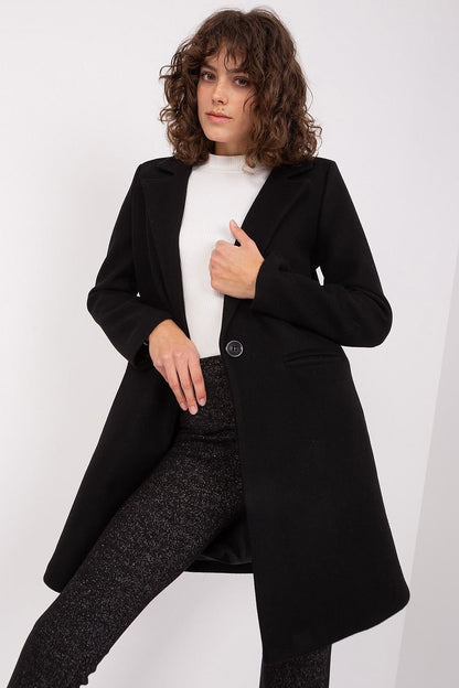 Classic women's polyester coat with button closure, long sleeves, and lining, ideal for both casual and formal wear in autumn and winter.






