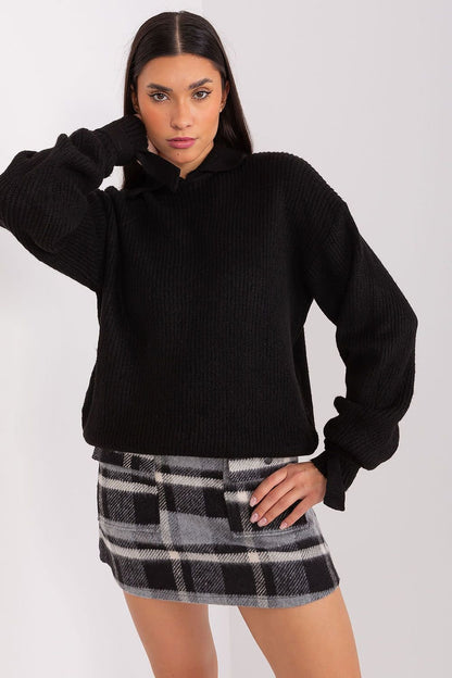 This unique black sweater seamlessly blends comfort and style, making it a standout addition to your collection. Its versatile design is perfect for both casual and semi-formal occasions.

