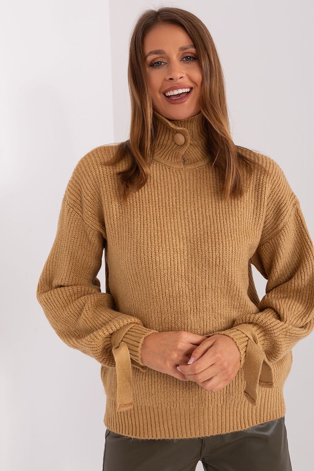 This unique brown sweater seamlessly blends comfort and style, making it a standout addition to your collection. Its versatile design is perfect for both casual and semi-formal occasions.

