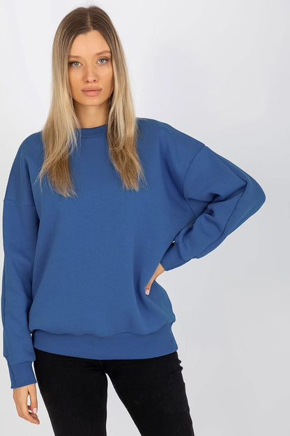 A women's sweatshirt with a looser cut, crafted from warm cotton for comfort. Features a round neckline, long sleeves, and ribbed hems at the bottom and cuffs in a matching color. Perfect for everyday wear and versatile styling.






