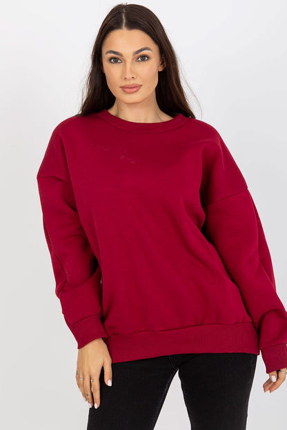 A women's sweatshirt with a looser cut, crafted from warm cotton for comfort. Features a round neckline, long sleeves, and ribbed hems at the bottom and cuffs in a matching color. Perfect for everyday wear and versatile styling.






