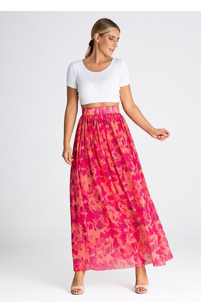 A long, flared skirt made of striking fabric with a crinkled waist and lined with 100% viscose for added comfort.

