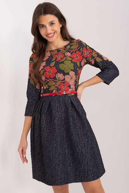 An elegant flared dress with floral embroidery, designed for various occasions. Featuring a pre-knee length, 3/4 sleeves, and a buckled belt, it accentuates the waist and exudes feminine charm. Made from cotton, the dress offers both comfort and class, with a covered zipper for easy wear. Perfect for work or special events, this dress combines elegance, comfort, and style.






