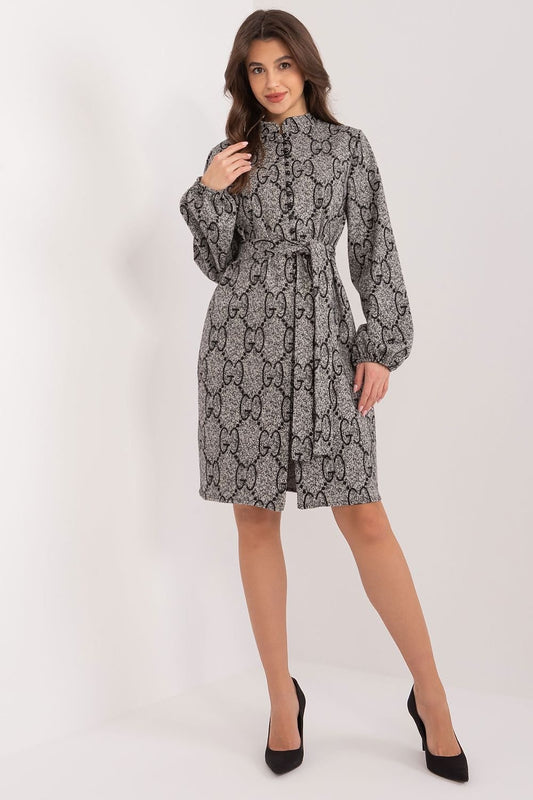 A chic knit dress with long sleeves, a stand-up collar, and puff sleeves, combining elegance and comfort. Featuring a button closure and a tie belt at the waist, this dress is made from soft cotton for a skin-friendly feel. Ideal for work or formal meetings, it offers a stylish yet versatile look.






