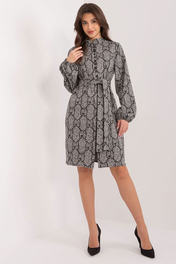 A chic knit dress with long sleeves, a stand-up collar, and puff sleeves, combining elegance and comfort. Featuring a button closure and a tie belt at the waist, this dress is made from soft cotton for a skin-friendly feel. Ideal for work or formal meetings, it offers a stylish yet versatile look.






