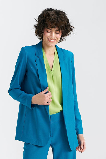 A casual yet elegant women's jacket with a regular, loose fit, crafted from a blend of viscose, linen, and cotton for ultimate comfort. Featuring lined lapels, shoulder pads for structure, and piped inner seams for a polished finish. With no fastening and an unlined design, it’s lightweight and perfect for warmer days, seamlessly blending sophistication with everyday wear.