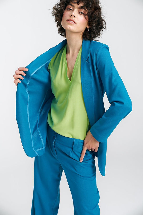 A casual yet elegant women's jacket with a regular, loose fit, crafted from a blend of viscose, linen, and cotton for ultimate comfort. Featuring lined lapels, shoulder pads for structure, and piped inner seams for a polished finish. With no fastening and an unlined design, it’s lightweight and perfect for warmer days, seamlessly blending sophistication with everyday wear.