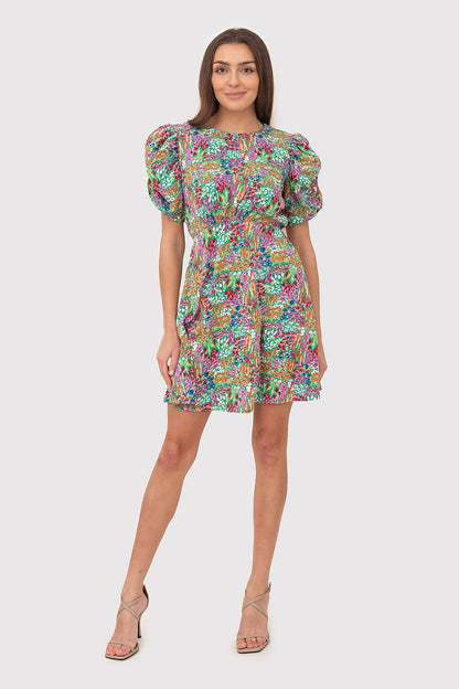 Light and flowing summer mini dress with a colorful floral print. Features decorative pleats, puff sleeves, and an elastic waistband for a comfortable and flattering fit. Ideal for warm weather outings.