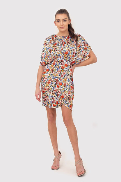 A vibrant summer mini dress featuring colorful flowers on flowing fabric, with decorative creases and wide sleeves. The elastic waistband ensures a comfortable and flattering fit, making it perfect for warm-weather outings.






