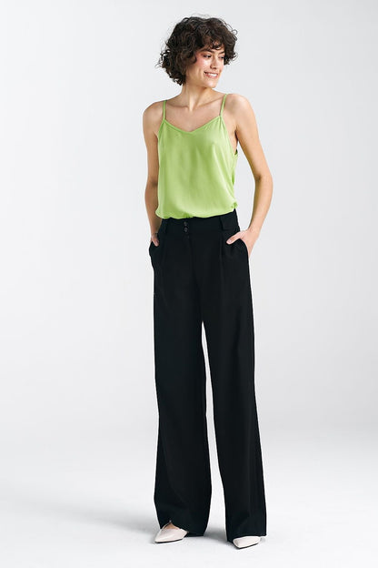 Women's relaxed fit pants made from a soft blend of viscose, linen, and cotton. Featuring wide legs, a mid-rise waist, decorative front tab, wide belt loops, functional front pockets, and imitation back pockets. Versatile and stylish for both casual and formal occasions.

