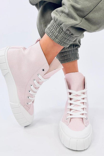 On-trend pink women's canvas ankle sneakers featuring a classic cut and a bold white thick sole. Made from fabric for both the outer and inner material, these sneakers are a must-have for those who love unique and fashionable styles. Perfect for making a statement this season.






