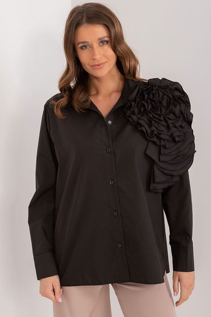 A sophisticated women's shirt made of smooth, breathable cotton, featuring a large decorative fabric flower on the front for a unique and elegant touch. The button-down design and long sleeves make it perfect for formal occasions, offering comfort and style for all-day wear.






