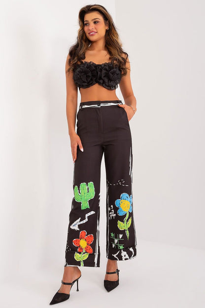 Comfortable polyester pants featuring a high waistband with elastic for a perfect fit, wide legs for freedom of movement, and discreet side pockets. The vibrant print adds energy and style, making them perfect for casual outings and everyday adventures.






