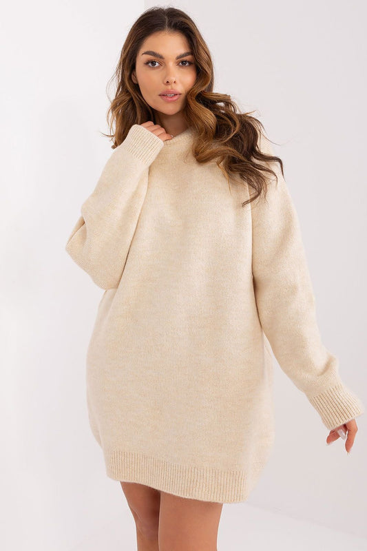 Soft and stretchy knitted mini dress made from acrylic, polyester, and elastane, featuring long sleeves, a classic round neckline, and a smooth fabric that adds elegance. Perfect for everyday wear, work, or social gatherings, offering both comfort and style.






