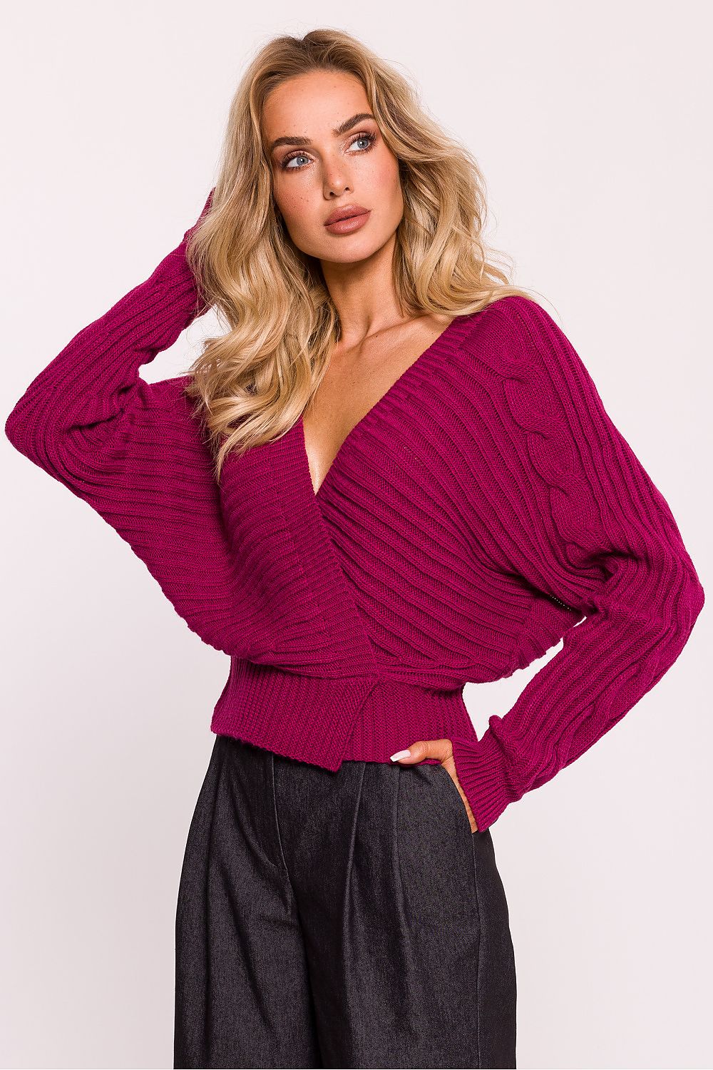 Elegant short women's sweater made of ribbed yarn, featuring a wrap-over design and deep V-neckline at both the front and back, perfect for everyday wear or special occasions.