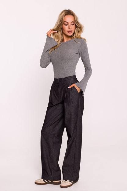 Stylish women's pants made from high-quality cotton, featuring wide legs for comfort and elegance. The waist is subtly emphasized with darts, and an elastic waistband ensures a perfect fit. Snap and fly fastening, along with side slip pockets, add practicality. Designed and made in Poland for a blend of modern design and excellent craftsmanship.






