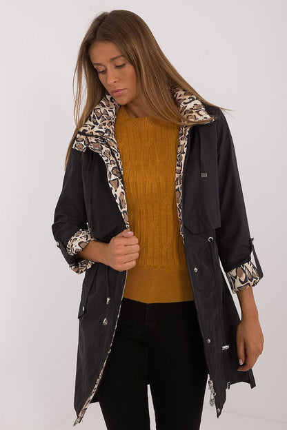 A versatile women's transitional jacket made of durable polyester, featuring long sleeves, a practical zipper closure with snaps, and a detachable hood. Designed with a fashionable animal motif lining, slip pockets, and a lightweight, unpadded design, it's perfect for the fall and winter seasons, offering comfort and style for varying weather conditions.






