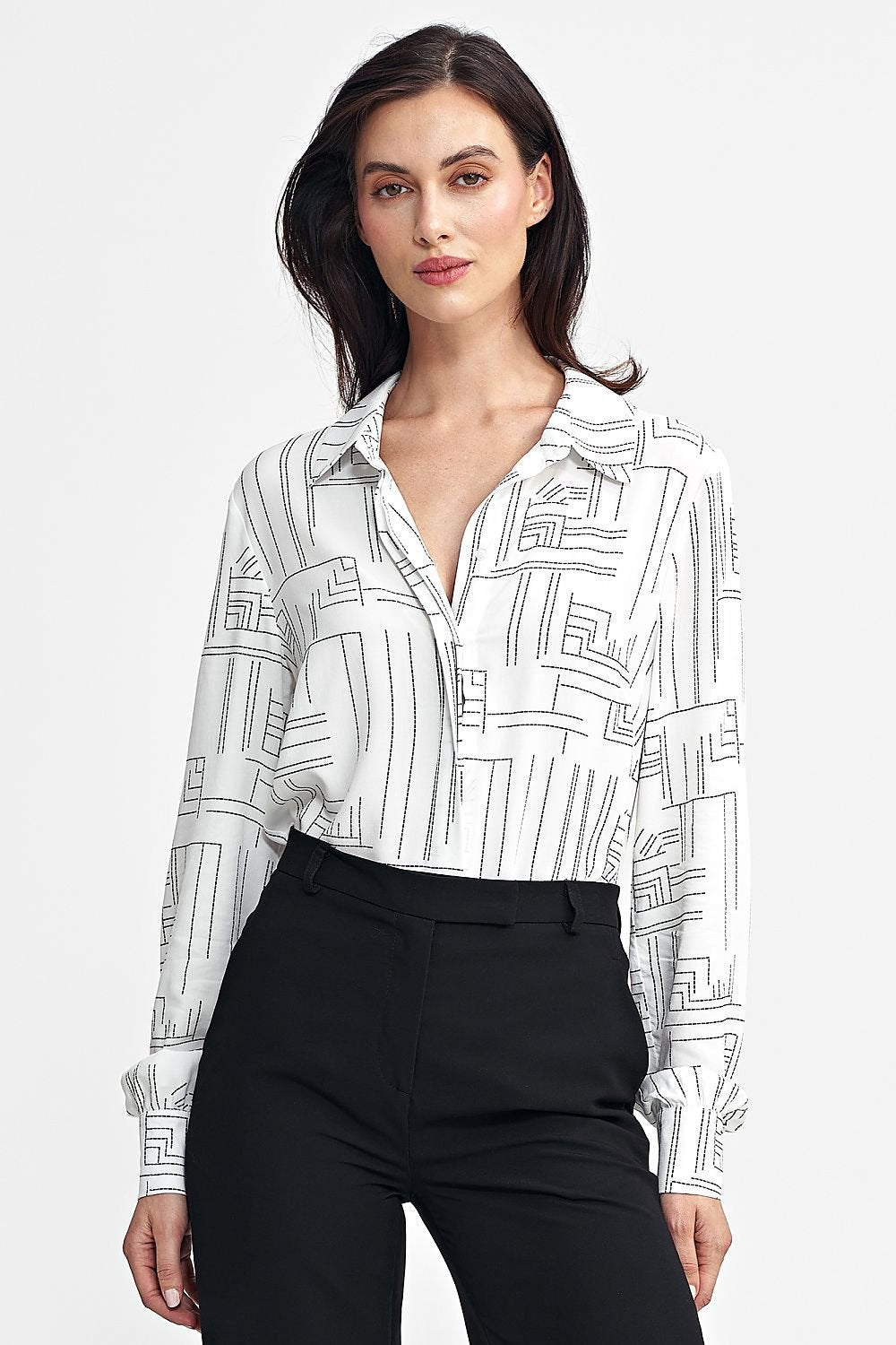 Women's regular-fit shirt made from high-quality viscose, featuring a minimalist geometric pattern, classic collar, long sleeves with cuffs, and a discreet button-up front hidden under a pleat. Perfect for both casual and formal occasions.