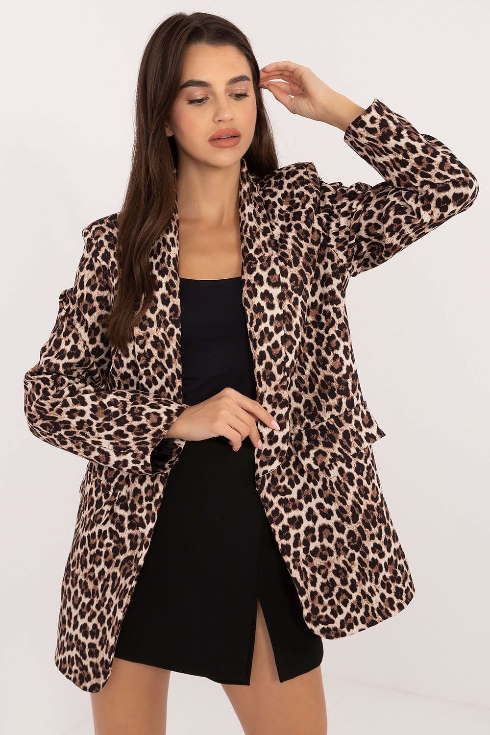 A chic women's jacket with shoulder pads and a bold zebra-leopard print, combining animal motifs for a distinctive look. Featuring no button closure for a modern, casual style, it’s made from high-quality polyester, lined for comfort, and perfect for work, formal meetings, or casual outings.