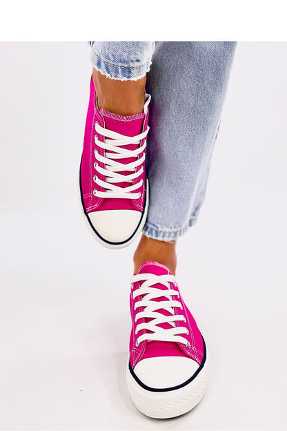 Timeless women's sneakers featuring a rubber sole and piping detail all around. Available in the season's trendiest colors, these sneakers offer both comfort and style. Made from fabric for a soft and breathable feel. Perfect for everyday wear.






