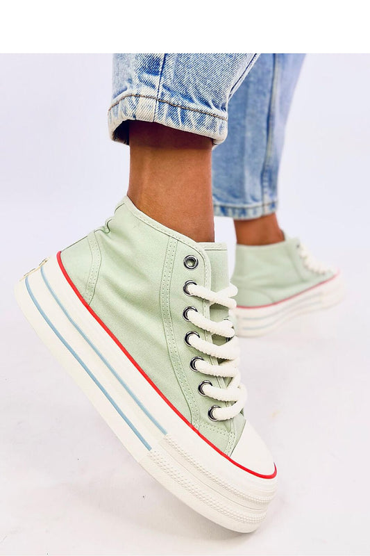 Eye-catching green women's ankle sneakers on a platform with thick laces and a high sole. Made from fabric for both outer and inner materials, these sneakers combine comfort and style. Perfect for those looking to make a bold, fashionable statement.






