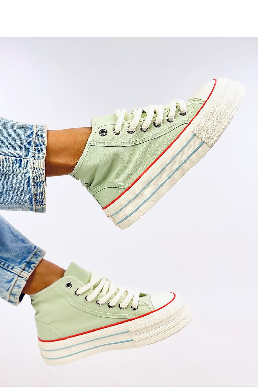 Eye-catching women's ankle sneakers on a platform with thick laces and a high sole. Made from fabric for both outer and inner materials, these sneakers combine comfort and style. Perfect for those looking to make a bold, fashionable statement.






